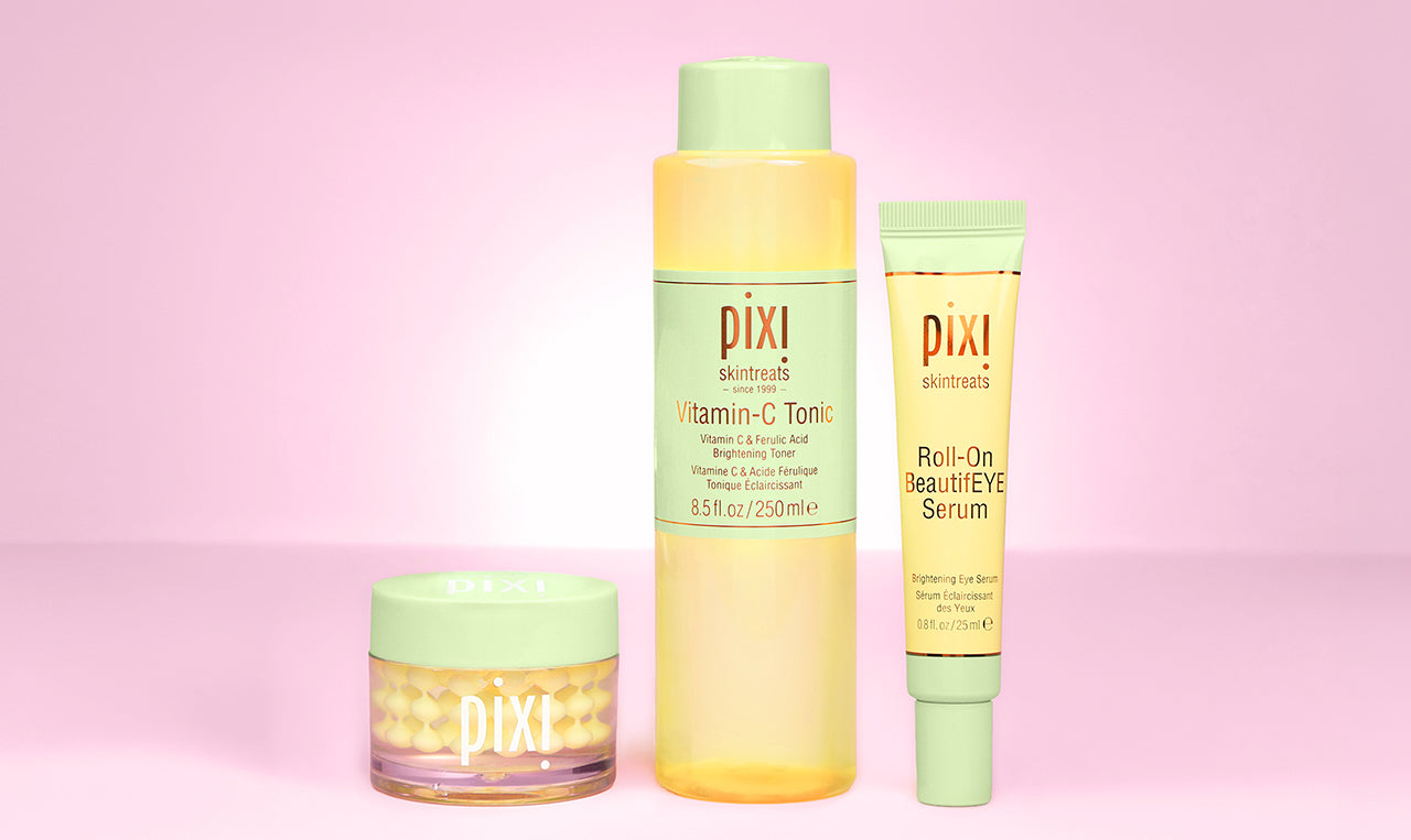 Pixi skincare products on a pink background including Vitamin-C CremeSerum, Tonic and Roll-On BeautifEYE Serum. Badge for People's Best New Launches 2026