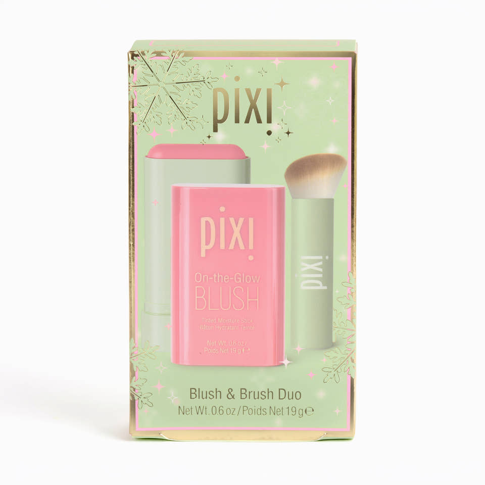 Pixi On-the-Glow Blush Blush & Brush Duo in its original packaging, featuring a pink blush stick and a light green makeup brush on a light green and gold illustrated box. view 2