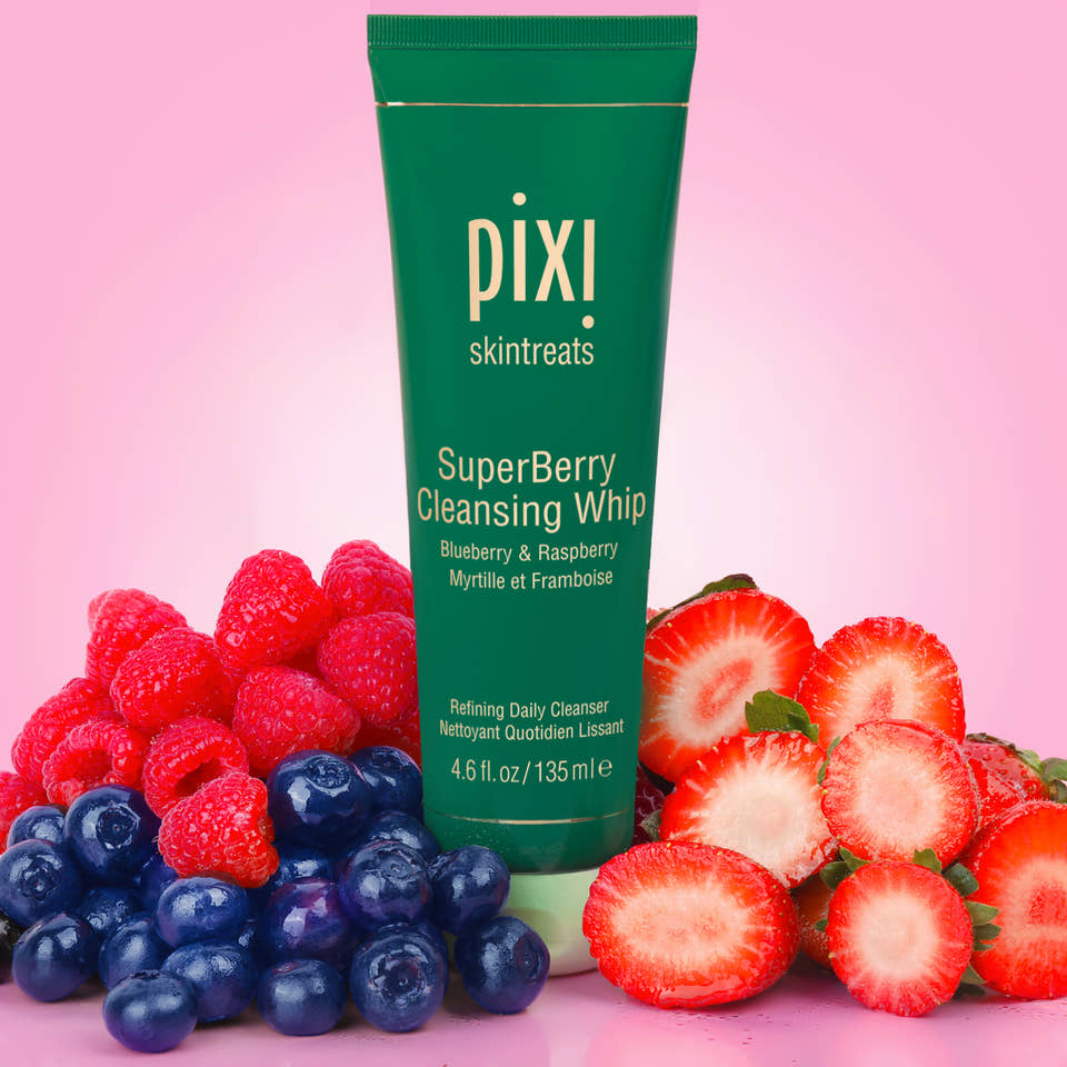Pixi SuperBerry Cleansing Whip with berries on a pink background view 1